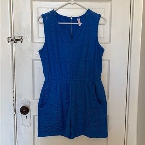 Blue shorts romper with lace detail